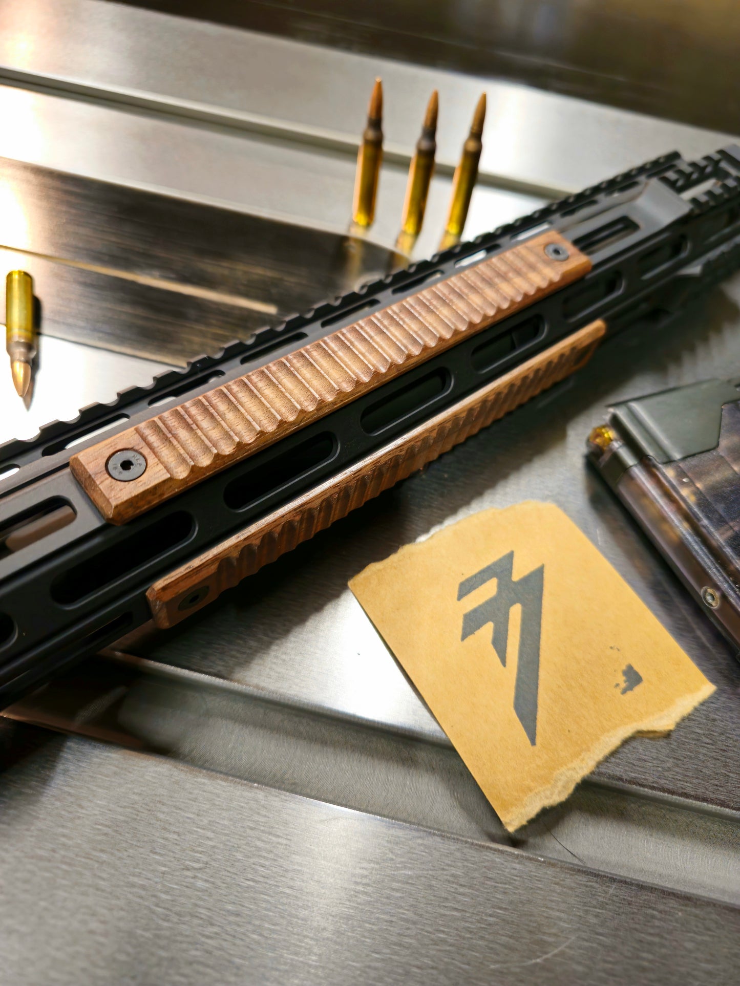 4 slot Ribbed style. Walnut color wood m-lok rail cover