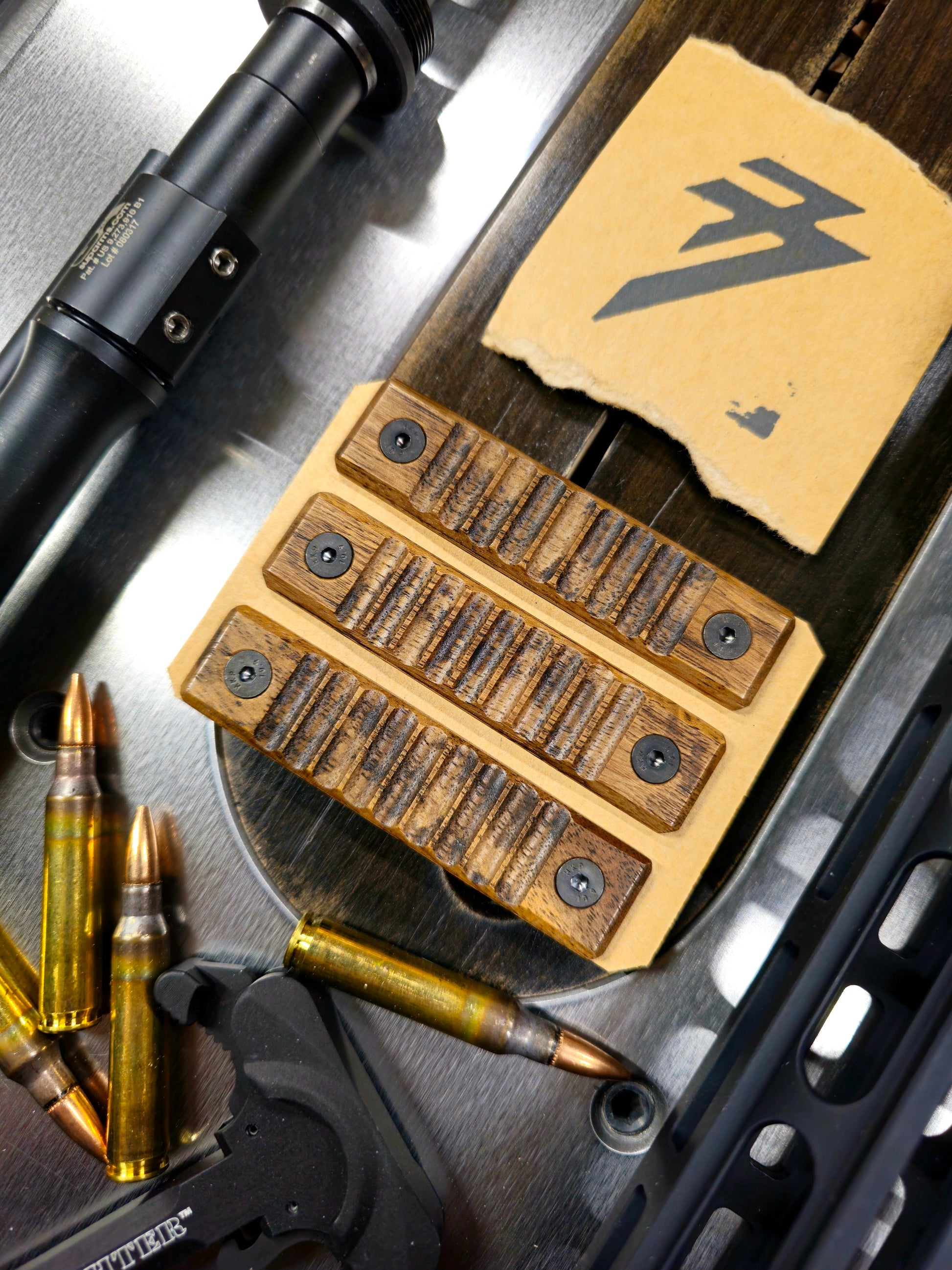 Top view of a unique set of 2 slot walnut handguard covers in Ribbed texture