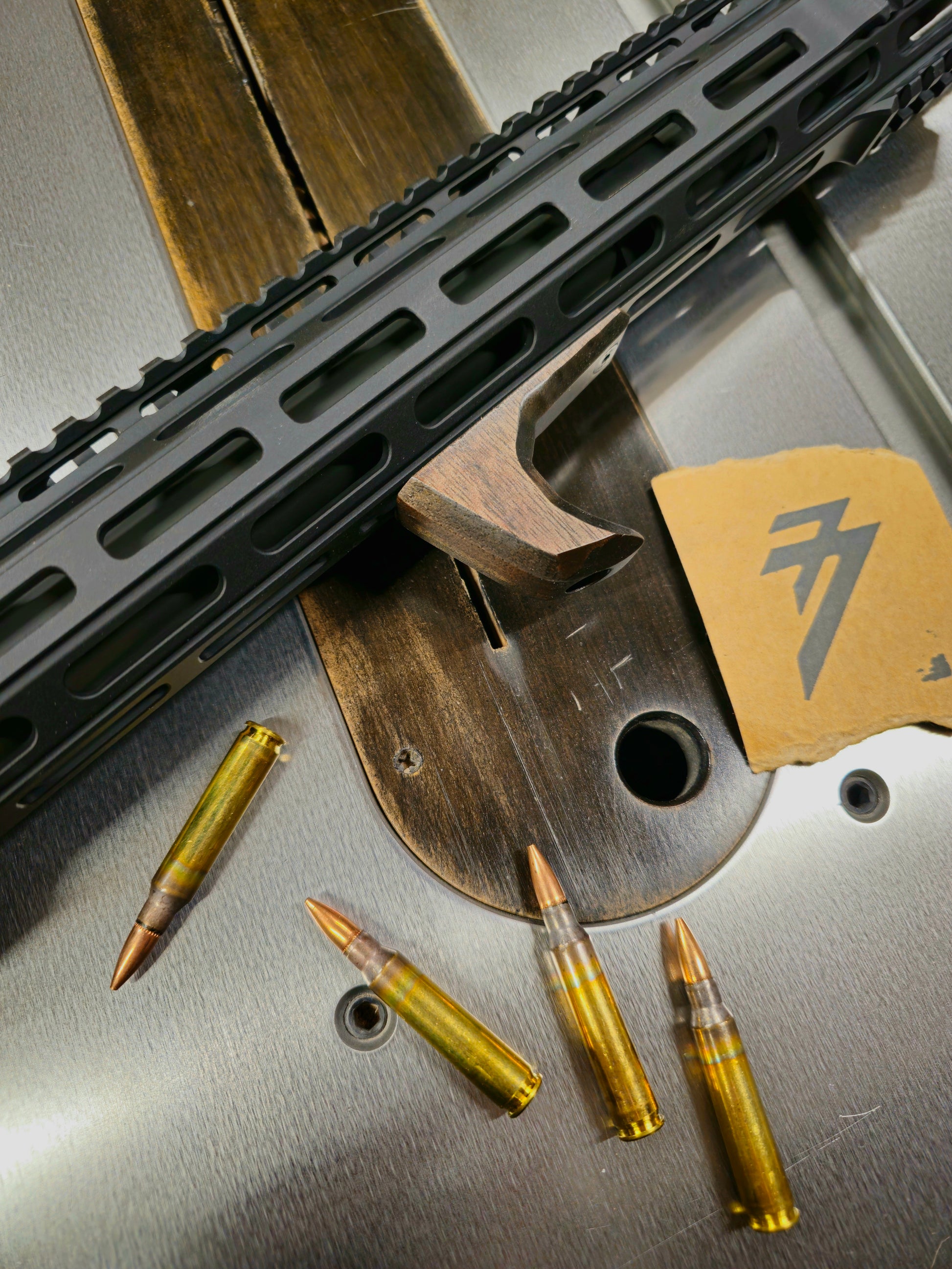 Top view blem wood angled grip mlok handstop. Short configuration