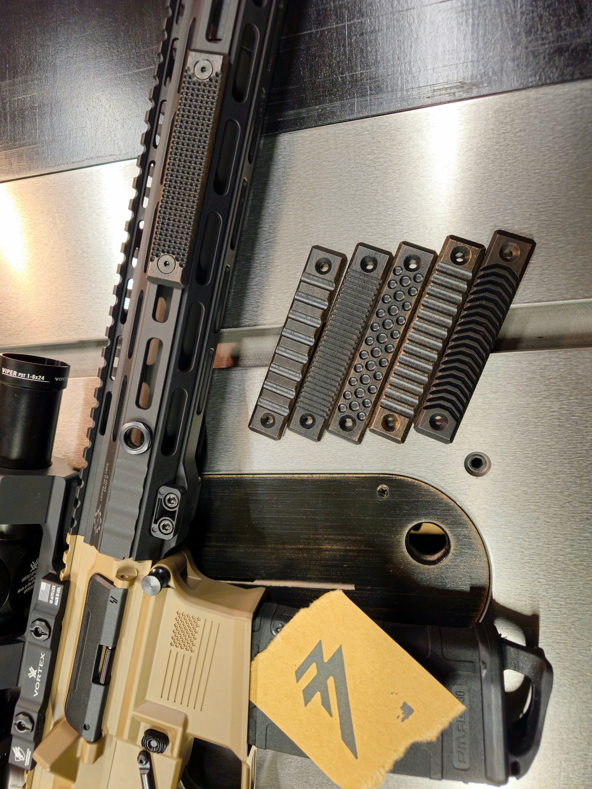 Blackout color option. 2.5 mlok slot length wood rail covers