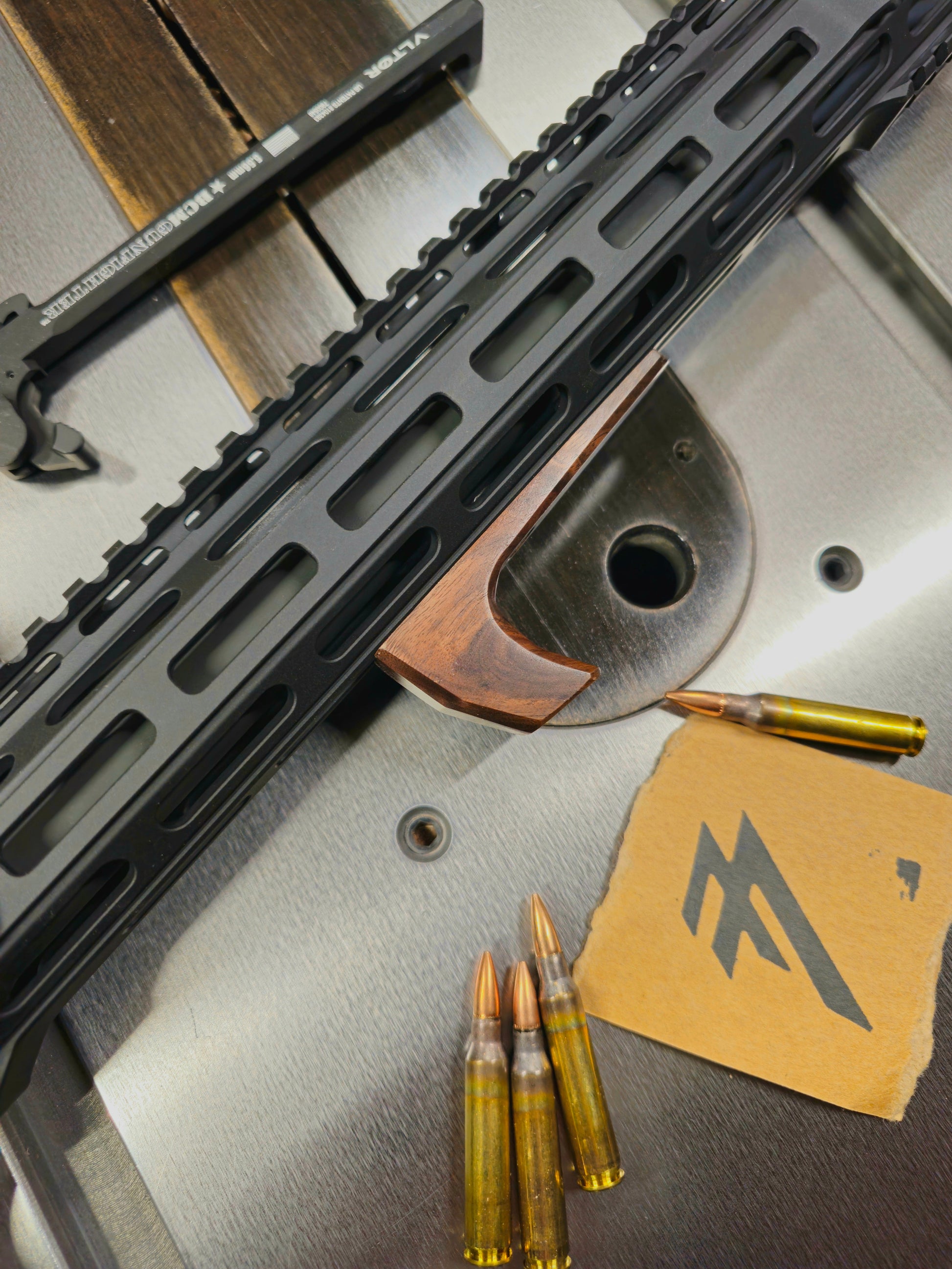 Top side of a blemished mlok angled Vertical foregrip